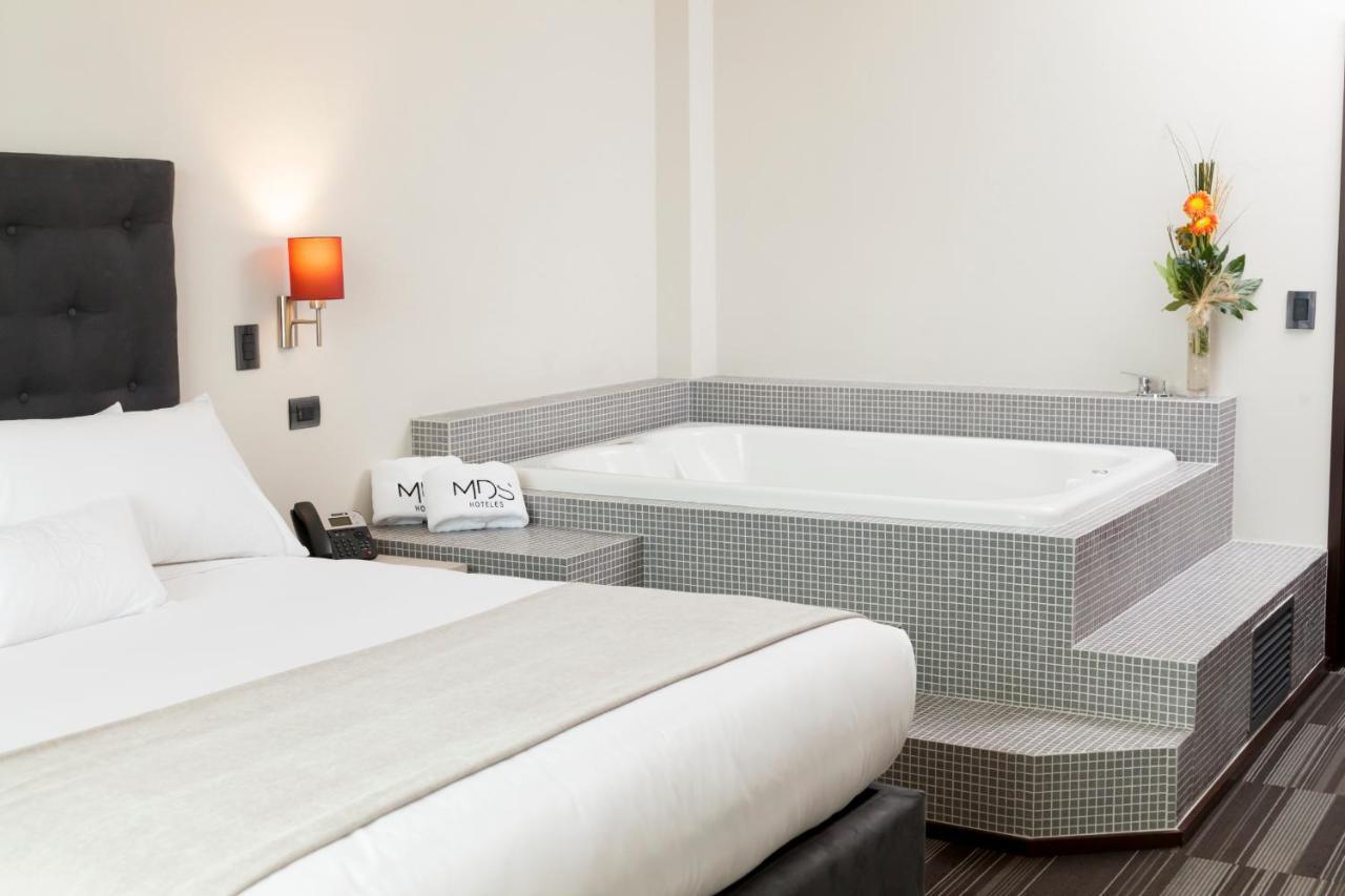 Mds Hotel Chillán Εξωτερικό φωτογραφία A whirlpool tub in a hotel room